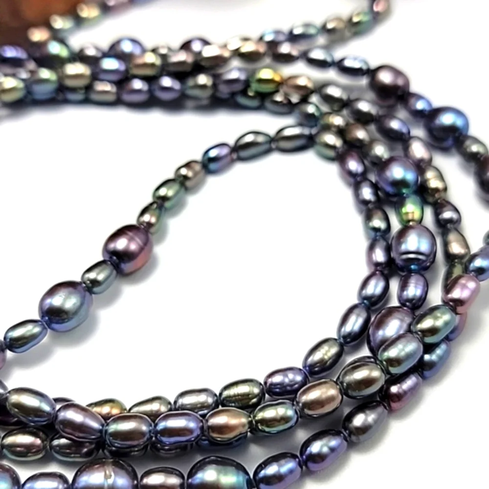 Lustrous Black Charcoal Fresh Water Peacock Pearl 66